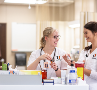 nursing students preparing medical viles